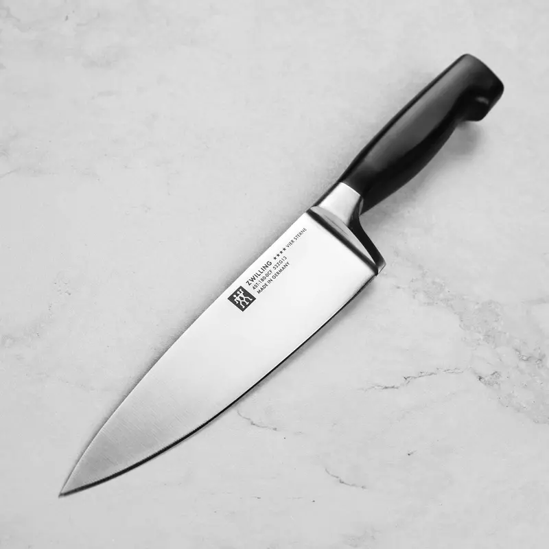 Zwilling Four Star 7-Inch Chef'S Knife — Forged German Steel 1